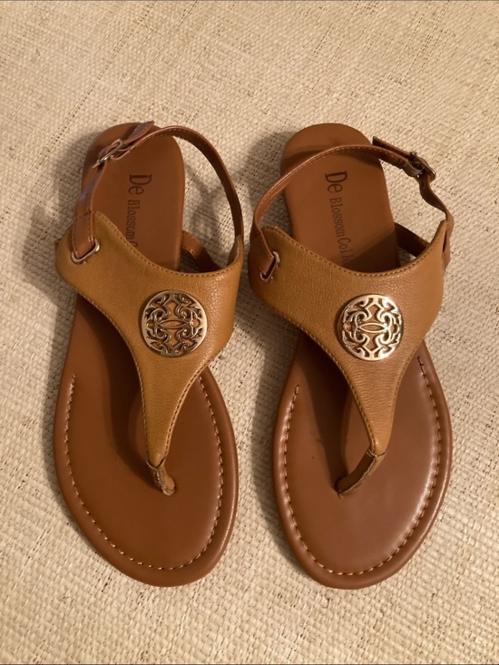De Blossom Collection Women's Tan T-Strap Sandals with Gold Medallion